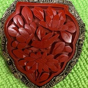 Red cinnabar vintage brooch